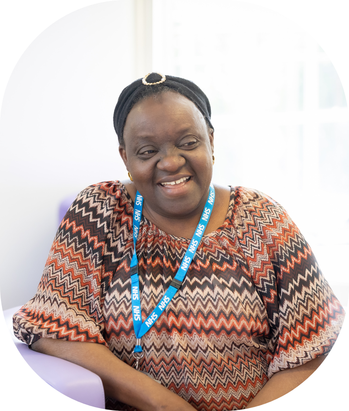 NHS female staff smiling